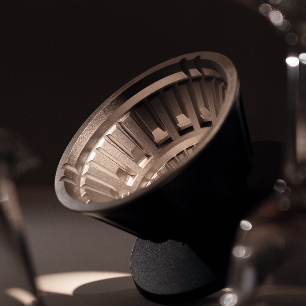TIMEMORE Vector metal dripper in a dark studio side profile